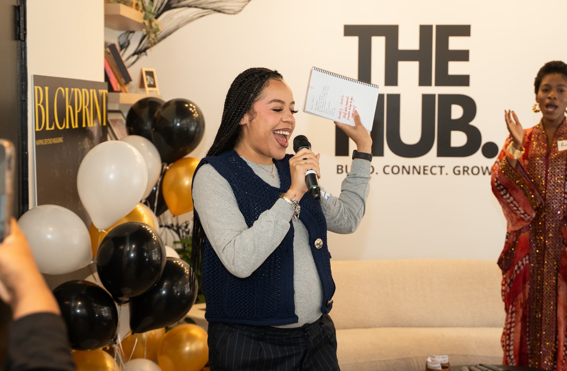 A speaker connecting with the audience at a previous Converge community event